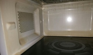如何清洗微波炉油渍（微波炉的油渍怎么清除）